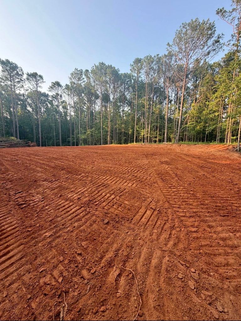 Red clay graded site prepared for construction — SAN Excavating